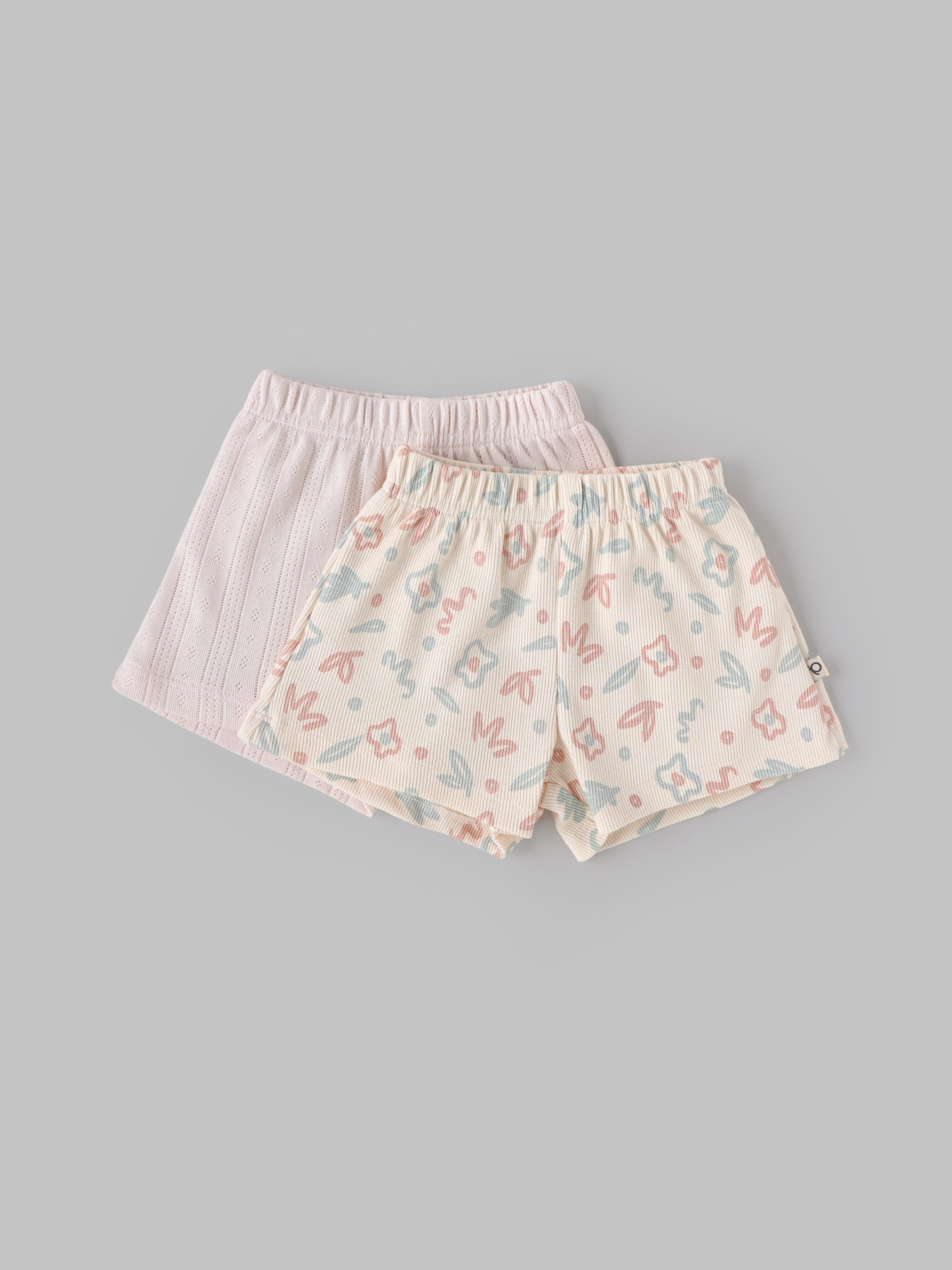 Popees Baby Girls Cotton Shorts Pack of 2 |Soft Solid & Floral Pull-On Shorts with Elastic Waist |Newborn–9 Months